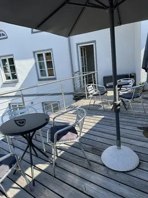 Ein Balkon oder eine Terrasse in der Unterkunft meywohnen Stadthaus Bad Aibling