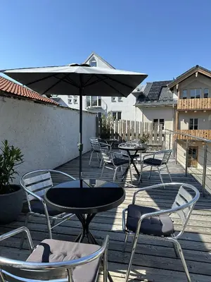 Ein Balkon oder eine Terrasse in der Unterkunft meywohnen Stadthaus Bad Aibling