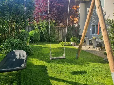 Ein Garten an der Unterkunft Ferienwohnung BaMBi