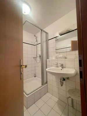 Ein Badezimmer in der Unterkunft Ferienwohnung Lilie - zentral in Bad Wiessee