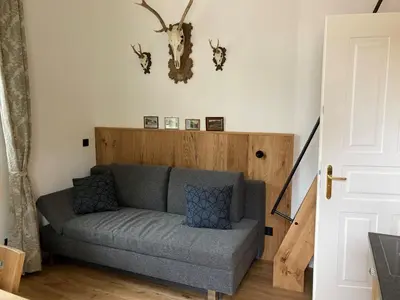 Ein Sitzbereich in der Unterkunft ciao-aschau Haus zur Burg Apartment Terrassenstüberl 113