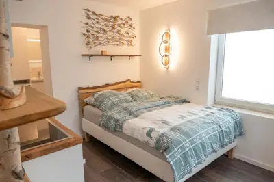 Ein Bett oder Betten in einem Zimmer der Unterkunft Apartment Graf
