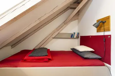 Ein Bett oder Betten in einem Zimmer der Unterkunft Ferienwohnung DAS SCHELLENWIES in Murnau