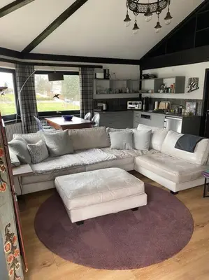 Ein Sitzbereich in der Unterkunft Ferienwohnung Thalia