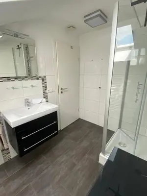Ein Badezimmer in der Unterkunft Ferienwohnung Baumgartner Chiemseeliebe 2OG