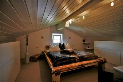 Ein Bett oder Betten in einem Zimmer der Unterkunft Ferienwohnung Heimatglück 2-3 Personen 65qm WLAN