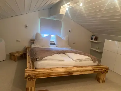 Ein Bett oder Betten in einem Zimmer der Unterkunft Ferienwohnung Heimatglück 2-3 Personen 65qm WLAN