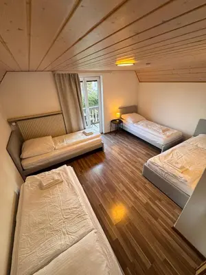 Ein Bett oder Betten in einem Zimmer der Unterkunft Bavaria Home - Parken - Küche - Balkon