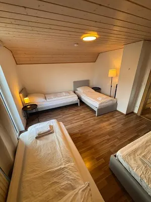 Ein Bett oder Betten in einem Zimmer der Unterkunft Bavaria Home - Parken - Küche - Balkon