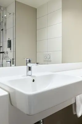 Ein Badezimmer in der Unterkunft Premier Inn München Messe