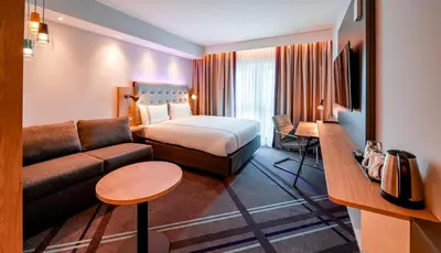 Ein Bett oder Betten in einem Zimmer der Unterkunft Premier Inn München Airport Süd