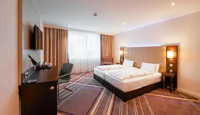Ein Bett oder Betten in einem Zimmer der Unterkunft Premier Inn München City Zentrum