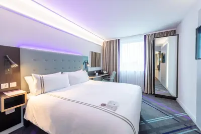 Ein Bett oder Betten in einem Zimmer der Unterkunft Premier Inn München Airport Ost