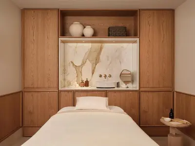 Ein Bett oder Betten in einem Zimmer der Unterkunft Rosewood Munich