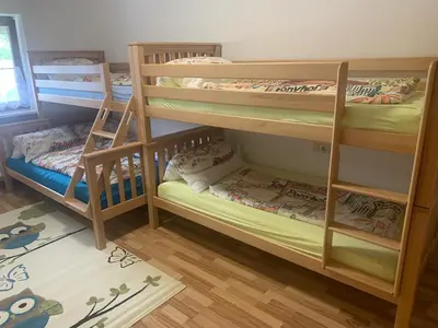 Ein Bett oder Betten in einem Zimmer der Unterkunft Ferienwohnung am Ponyhof