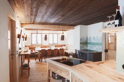Ein Restaurant oder anderes Speiselokal in der Unterkunft Hasenalm