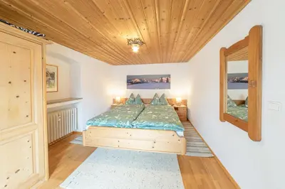 Ein Bett oder Betten in einem Zimmer der Unterkunft Ferienwohnungen Zum Bachl Signalkopf