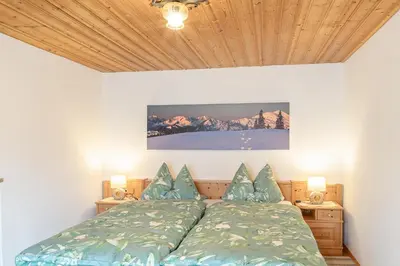 Ein Bett oder Betten in einem Zimmer der Unterkunft Ferienwohnungen Zum Bachl Signalkopf