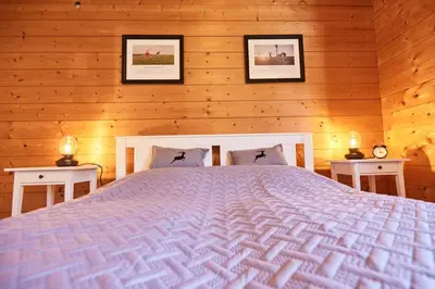 Ein Bett oder Betten in einem Zimmer der Unterkunft Ferienwohnung Hubert