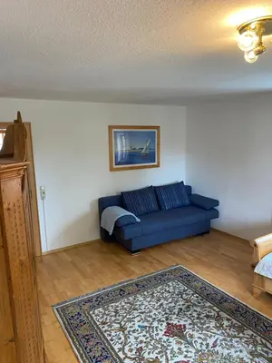 Ein Sitzbereich in der Unterkunft Nabo Ferienwohnung Lechbruck