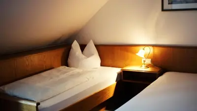 Ein Bett oder Betten in einem Zimmer der Unterkunft Pension Rupertstubn