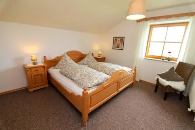 Ein Bett oder Betten in einem Zimmer der Unterkunft Gästehaus Café Habersetzer