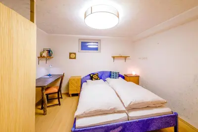 Ein Bett oder Betten in einem Zimmer der Unterkunft Zum Engelreich ruhig, ländlich, stadtnah