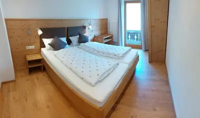 Ein Bett oder Betten in einem Zimmer der Unterkunft Pilzhof