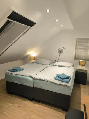 Ein Bett oder Betten in einem Zimmer der Unterkunft Helle Wohnung mit zwei Schlafzimmern