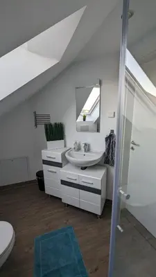 Ein Bett oder Betten in einem Zimmer der Unterkunft Helle Wohnung mit zwei Schlafzimmern