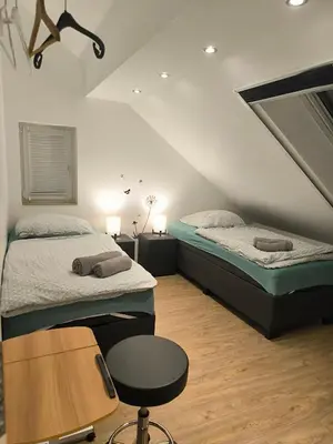 Ein Bett oder Betten in einem Zimmer der Unterkunft Helle Wohnung mit zwei Schlafzimmern