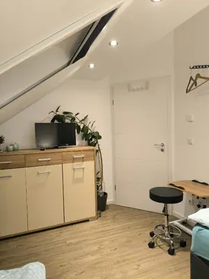 TV/Unterhaltungsangebot in der Unterkunft Helle Wohnung mit zwei Schlafzimmern