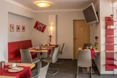 Ein Sitzbereich in der Unterkunft Pension Torkel-Stube