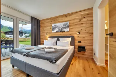 Ein Bett oder Betten in einem Zimmer der Unterkunft Hubertus 13