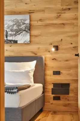 Ein Bett oder Betten in einem Zimmer der Unterkunft Hubertus 13