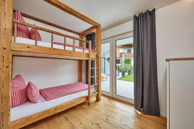 Ein Bett oder Betten in einem Zimmer der Unterkunft Hubertus 13