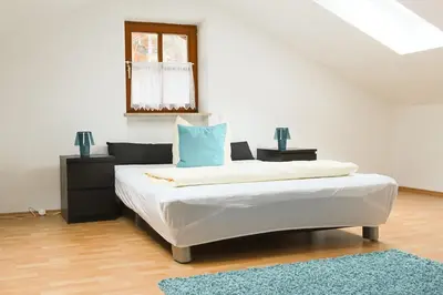 Ein Bett oder Betten in einem Zimmer der Unterkunft Gloria