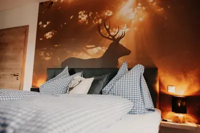 Ein Bett oder Betten in einem Zimmer der Unterkunft Wohnung Schrödelstein neues Highlight Fliegenfischen auf der Isar