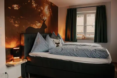 Ein Bett oder Betten in einem Zimmer der Unterkunft Wohnung Schrödelstein neues Highlight Fliegenfischen auf der Isar