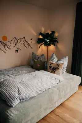 Ein Bett oder Betten in einem Zimmer der Unterkunft Wohnung Finstermünz Neues Highlight Fliegenfischen auf der Isar