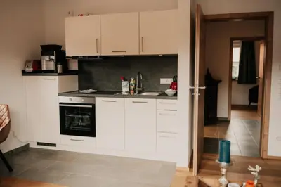 Küche/Küchenzeile in der Unterkunft Wohnung Finstermünz Neues Highlight Fliegenfischen auf der Isar