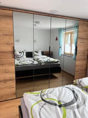 Ein Bett oder Betten in einem Zimmer der Unterkunft Ferienwohnung beim Mane