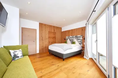 Ein Bett oder Betten in einem Zimmer der Unterkunft Das Gsteig