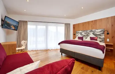 Ein Bett oder Betten in einem Zimmer der Unterkunft Das Gsteig