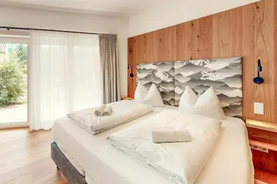 Ein Bett oder Betten in einem Zimmer der Unterkunft Das Gsteig