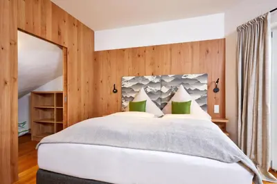 Ein Bett oder Betten in einem Zimmer der Unterkunft Das Gsteig