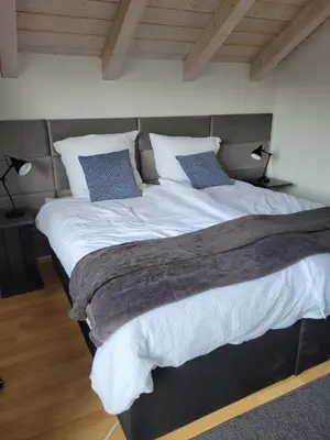 Ein Bett oder Betten in einem Zimmer der Unterkunft Haus Lärche - Die Ferienwohnung