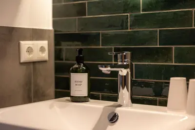 Ein Badezimmer in der Unterkunft Hotel Baumann
