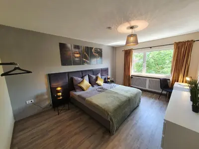 Ein Bett oder Betten in einem Zimmer der Unterkunft ☆ Like @ home *☆ moderne Wohnung in Oberottmarshausen ☆ Netflix