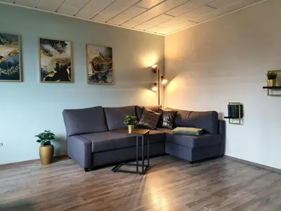 Ein Sitzbereich in der Unterkunft ☆ Like @ home *☆ moderne Wohnung in Oberottmarshausen ☆ Netflix